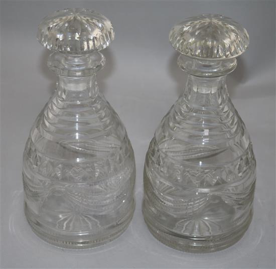 A pair of Regency Irish cut glass mallet form decanters and stoppers, height 25cm